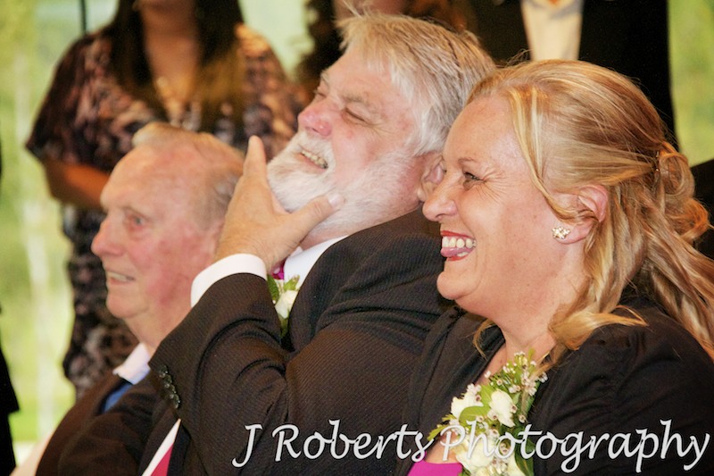 Mother and Father of groom laughing during ceremony - wedding photography sydney